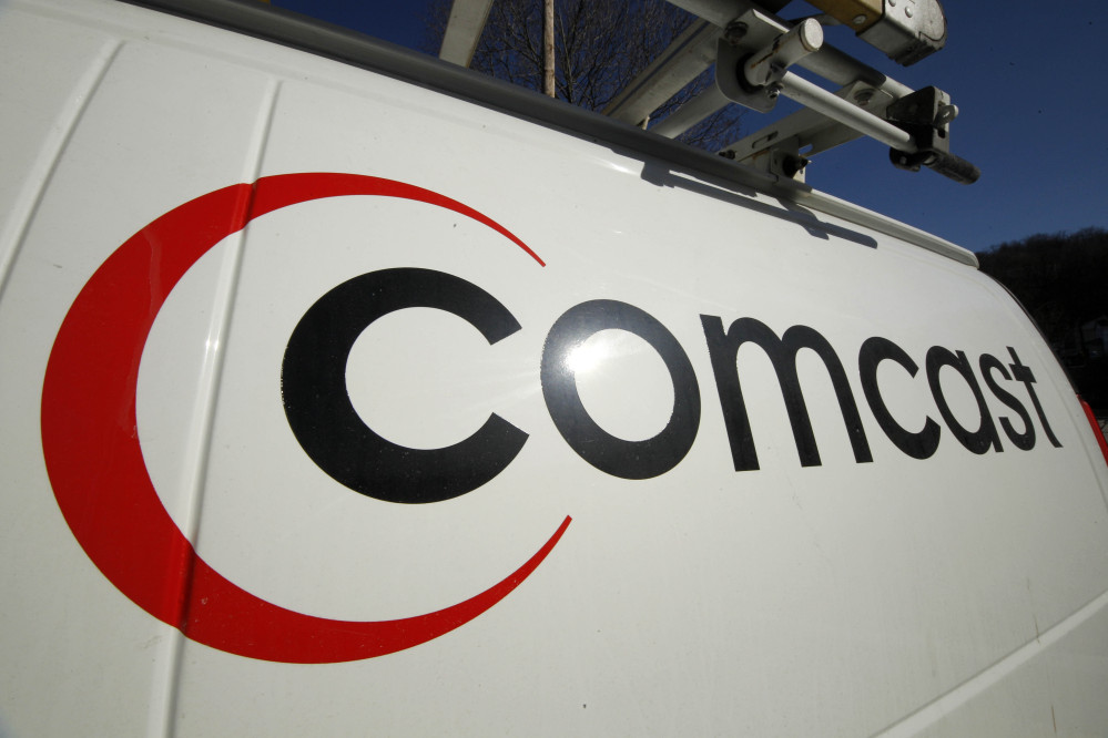 Comcast logo appears on one of the company’s vehicles in Pittsburgh.