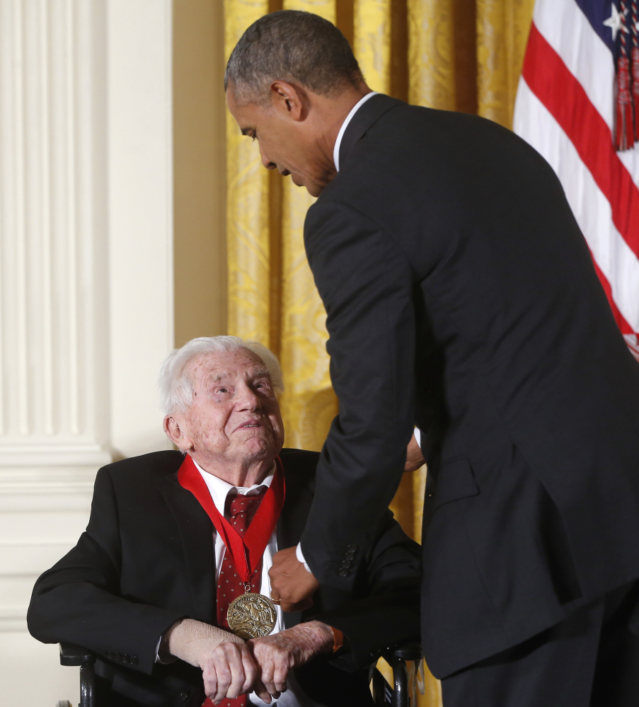 President Obama awards the 2013 National Humanities Medal to acclaimed literary critic, author and teacher M.H. Abrams at a ceremony in the White House in 2014.