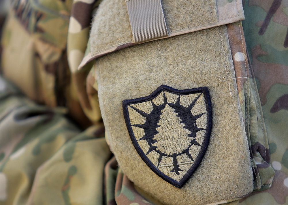 A pine tree uniform patch shows this Army National Guard member serving in Afghanistan is part of Maine’s 133rd Engineer Battalion.