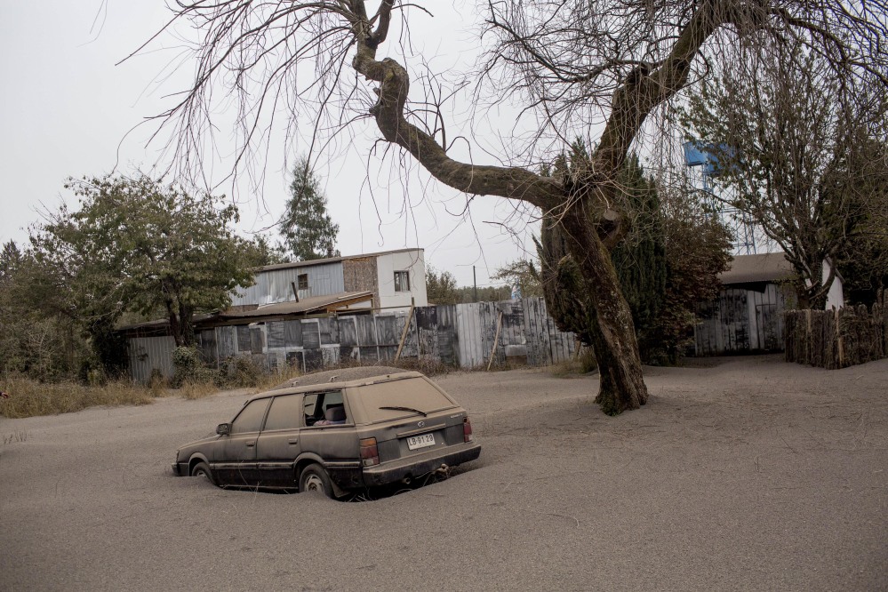 A car is covered in ash left behind by the eruptions of the Calbuco volcano in Ensenada, Chile, on Thursday.
