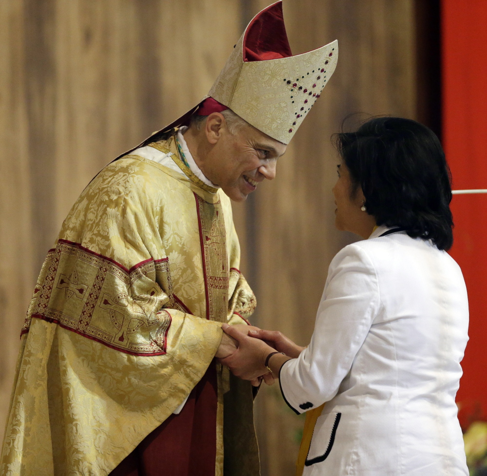 Archbishop Salvatore J. Cordileone, seen greeting a congregation member at the Cathedral of St. Mary of the Assumption in San Francisco, has prompted local Catholics to publicize their complaints about his traditional views.