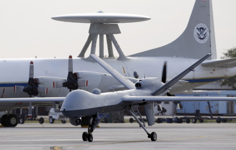 A Predator B unmanned aircraft taxis at the Naval Air Station in Corpus Christi, Texas. After more deaths than expected occurred in a drone strike, troubling questions are raised about U.S. claim of accuracy for the drone program.