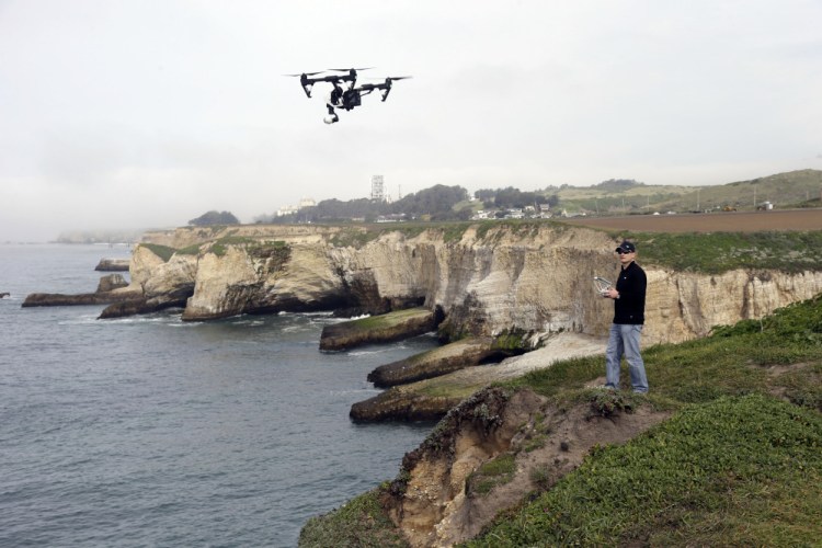 Romeo Durscher, director of education for drone-maker DJI, flies one of his company’s products in Davenport , Calif.