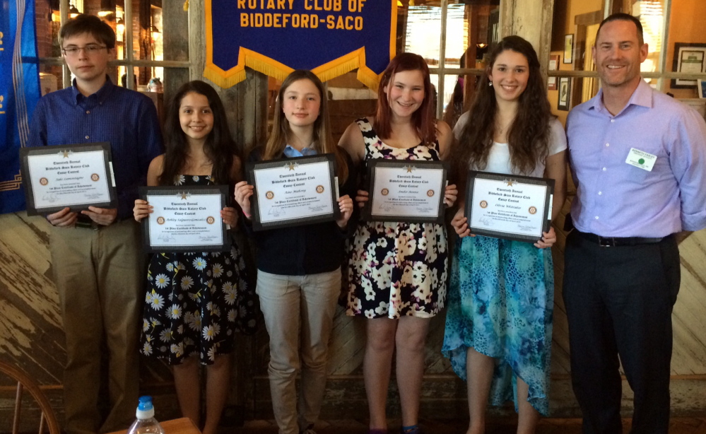 Winners of the Biddeford-Saco Rotary Club’s 20th annual essay contest are, from left, Jake Lamontagne, Thornton Academy Middle School; Ashley Salguero-Gonzalez, Saco Middle School; Aine Mahony, St. James School; Amber Rennie, Loranger Middle School; and Olivia Whittaker, Biddeford Middle School. Rotary President Ken Farley is at right.