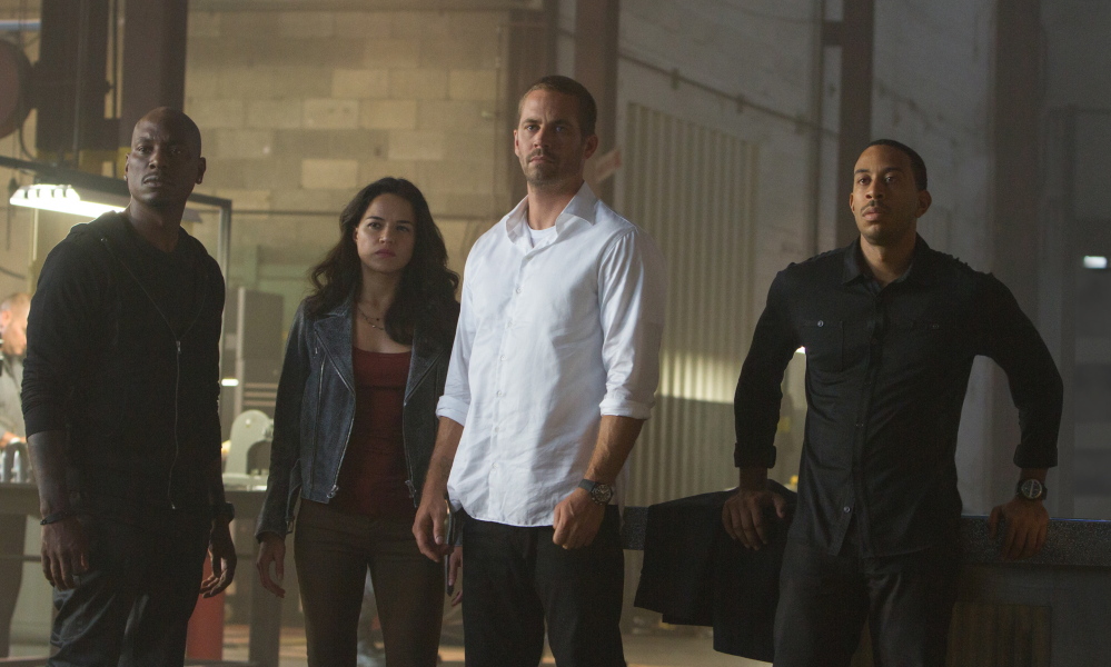 "Furious 7" has ruled the box office for the last month. The cast includes, from left, Tyrese Gibson, Michelle Rodriguez, Paul Walker and Chris Bridges.