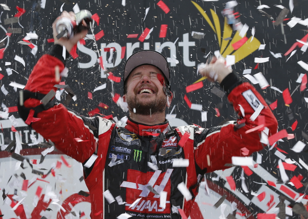 Kurt Busch celebrates after his victory Sunday in the Sprint Cup race at Richmond International Raceway.