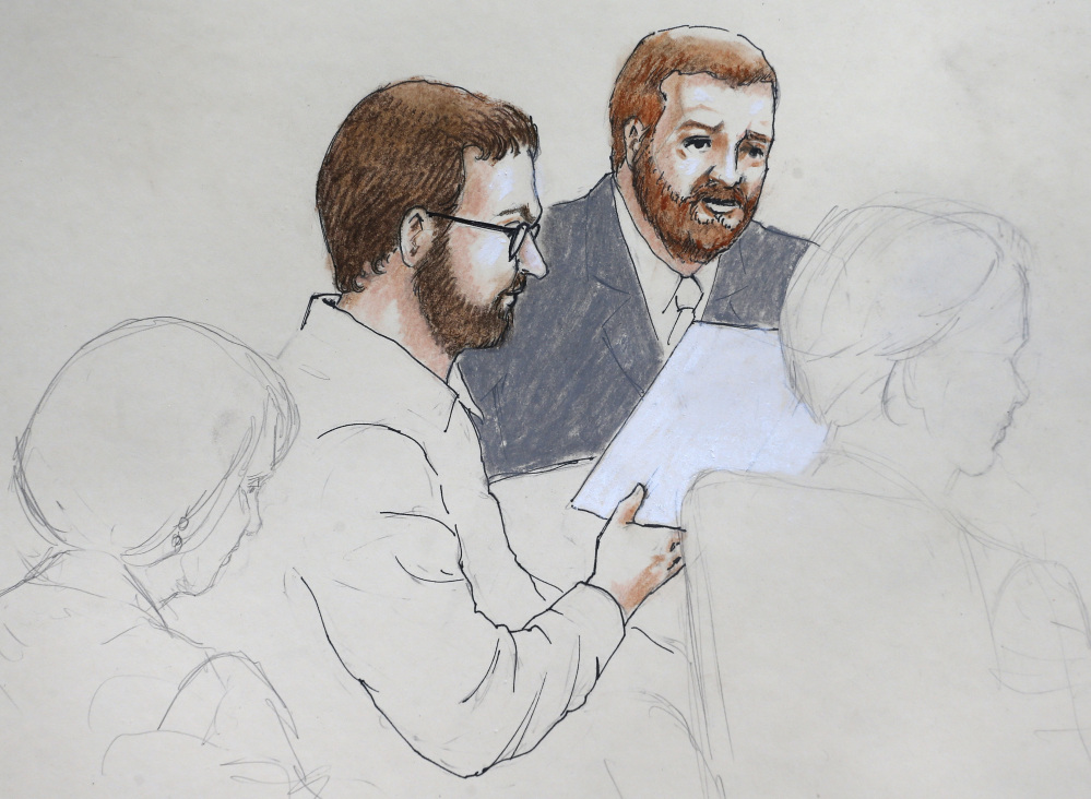 This sketch by courtroom artist Jeff Kandyba depicts Aurora theater shooting defendant James Holmes, center left, and defense attorney Daniel King in court at the Arapahoe County Justice Center on the first day of Holmes’ trial, in Centennial, Colo., on Monday.