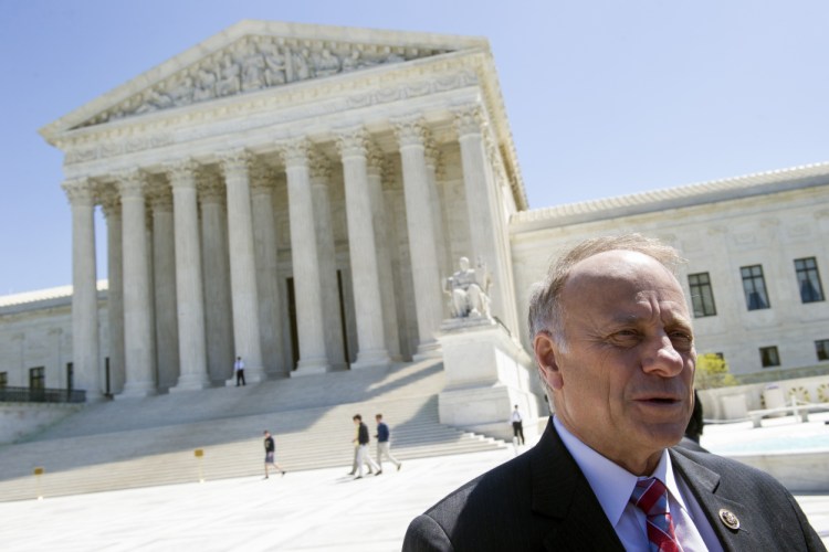 Rep. Steve King, R-Iowa, speaks with reporters in front of the Supreme Court in 2015.