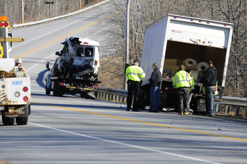 Emergency crews work at the scene of a collision between a conversion van and a panel truck near the intersection of U.S. Route 202 and Royal Street in Winthrop in November 2013. The crash killed Napoleon Richard St. Laurent, 80, and Patricia St. Laurent, 74.