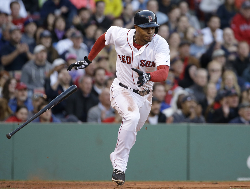 Xander Bogaerts runs to first after hitting an RBI single off a pitch by Toronto Blue Jays starting pitcher Drew Hutchison. 