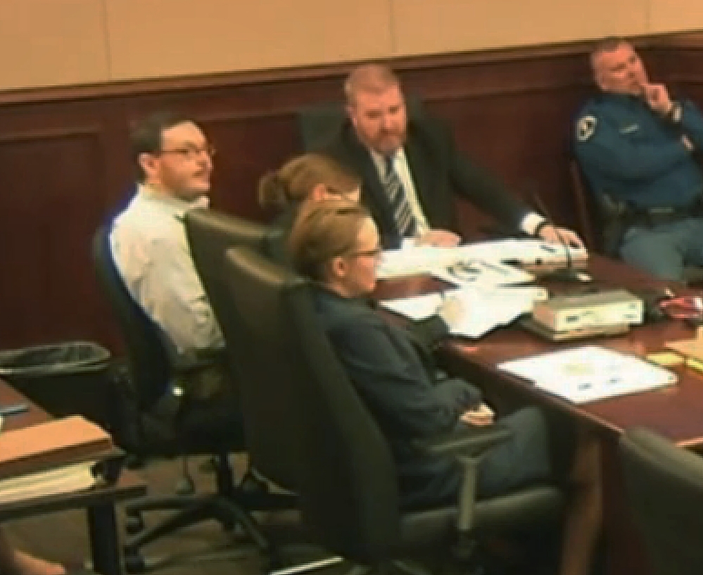 Colorado theater shooter James Holmes, far left, sits at the defense table at the opening of his trial in Centennial, Colo., Monday. The trial will determine if he’ll be executed, spend his life in prison, or be committed to an institution as criminally insane.