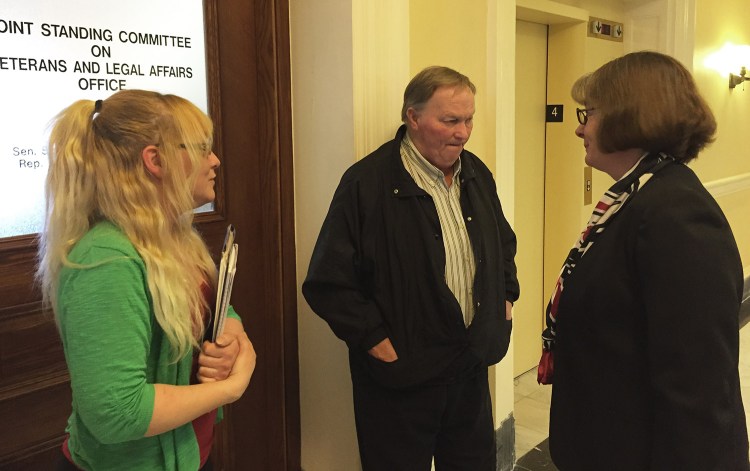 Jenny McPherson, left, and her father, Craig McPherson Sr., speak with Rep. Stacey Guerin about a bill to criminalize driving while extremely tired. Craig McPherson Jr. died in a car crash in Windham March 9, 2014, when his car collided with a car driven by someone who was allegedly fatigued.
