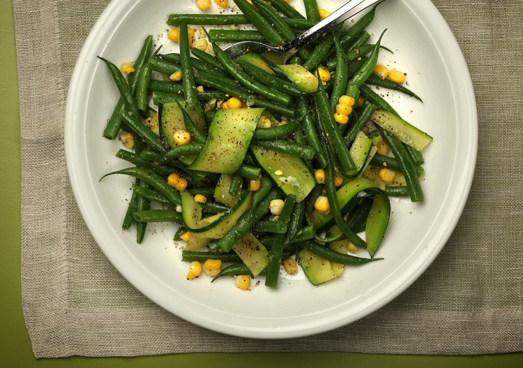 Green beans, corn and zucchini come together with a simple lemon viaigrette.