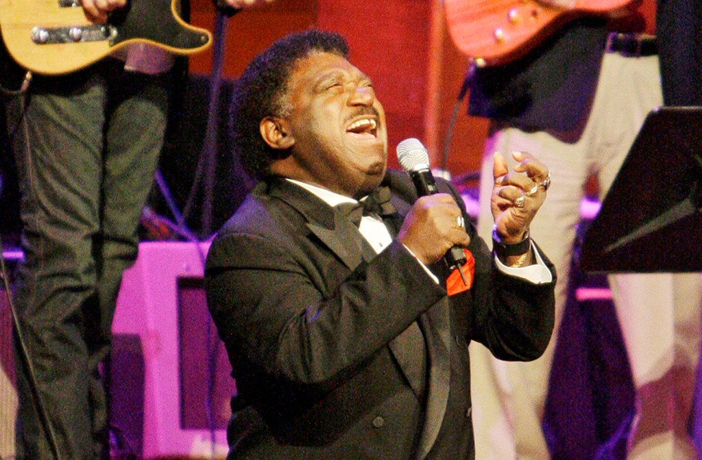 Percy Sledge performs "When a Man Loves a Woman" along with the Muscle Shoals Rhythm Section at the Musicians Hall of Fame awards show in Nashville, Tenn., on Oct. 28, 2008. (The Associated Press)