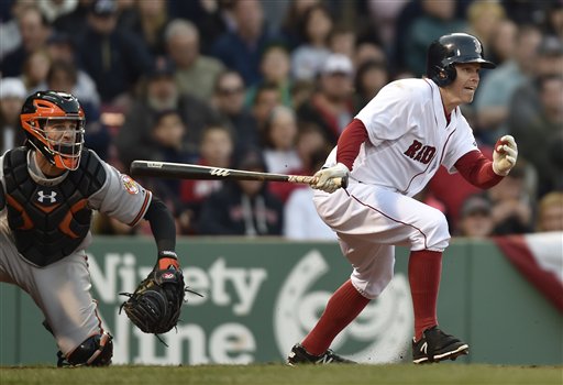 Red Sox center fielder Brock Holt hits an infield single in the seventh inning against the Orioles on Saturday. The Associated Press
