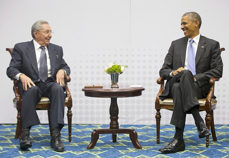 President Barack Obama and  Cuban President Raul Castro meet at the Summit of the Americas in Panama City, Panama, on April 11. The Associated Press