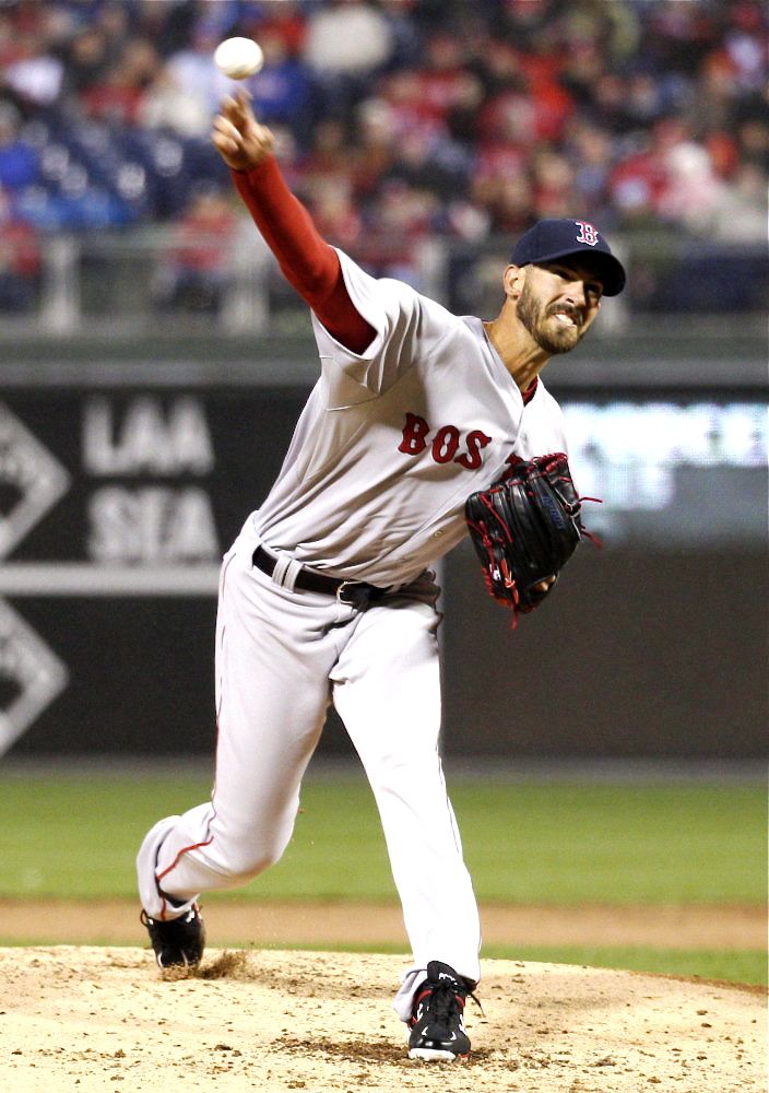 Red Sox starting pitcher Rick Porcello throws during the second inning Wednesday night against the Philadelphia Phillies. Porcello, who just signed an $82.5 million, four-year contract with the Red Sox, allowed three runs on six hits in six innings in his debut for Boston. The Associated Press