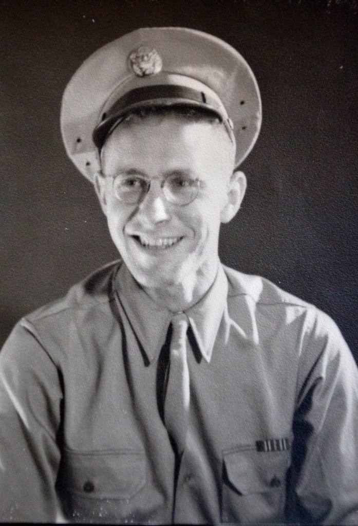 George Watson, in his official military photo from 1941. "I don't feel special" for serving, he said. "I think there was a war and I served because that's what you did."
