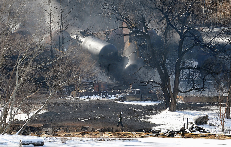 The scene of a train derailment near Mount Carbon, W.Va., in February. Rail tank cars that are used to transport most crude oil and other flammable liquids will have to be built to stronger standards under a series of new rules unveiled Friday by U.S. and Canadian transportation officials. 2015 Associated Press File Photo