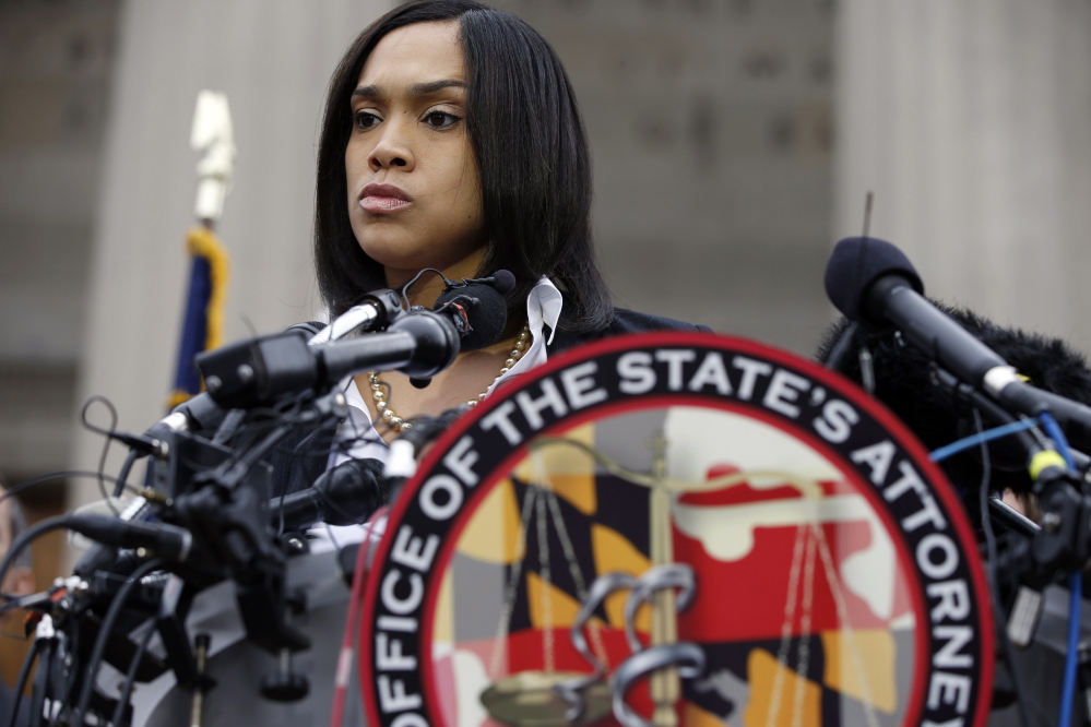 Marilyn Mosby, Baltimore state's attorney, pauses while speaking during a media availability, Friday, May 1, 2015 in Baltimore.  Mosby announced criminal charges against all six officers suspended after Freddie Gray suffered a fatal spinal injury while in police custody.(AP Photo/Alex Brandon)