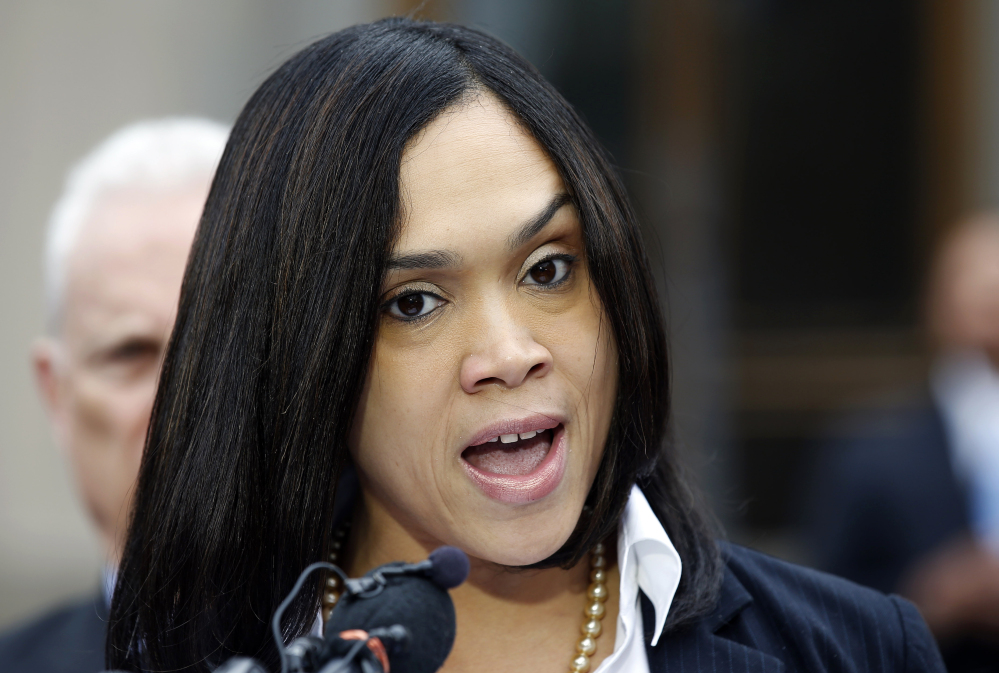 Marilyn Mosby, Baltimore state’s attorney, announces criminal charges against all six police officers suspended after Freddie Gray suffered a fatal spinal injury.