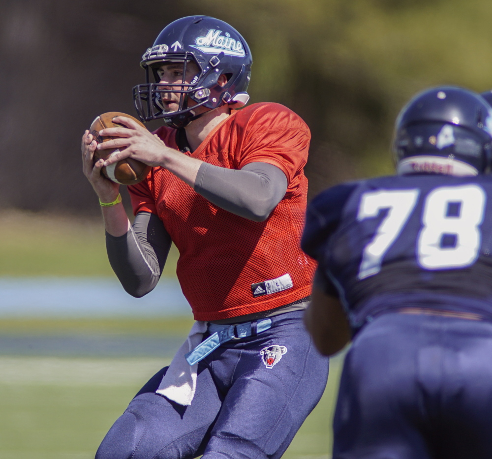 Drew Belcher, who threw two touchdown passes in a scrimmage Saturday, will continue to compete with Dan Collins for the No. 1 quarterback job when the UMaine football camp opens in August.