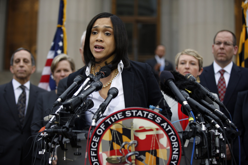 Marilyn Mosby, Baltimore state's attorney, announced criminal charges against all six officers suspended after Freddie Gray suffered a fatal spinal injury while in police custody.  The Associated Press
