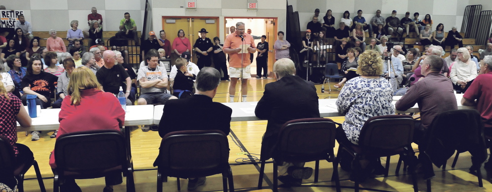 Phil Goodell Jr., center, speaks to the SAD 54 school board and administrators during a forum on the use of the word “Indians” for school sports team in Skowhegan on Monday.