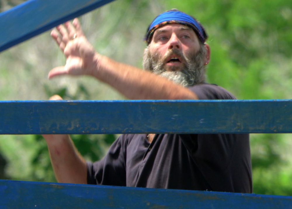 Dan Foley competes in the 12th episode of the CBS reality-TV show “Survivor.” He escaped getting voted off Wednesday night after another castaway was deemed a bigger threat.