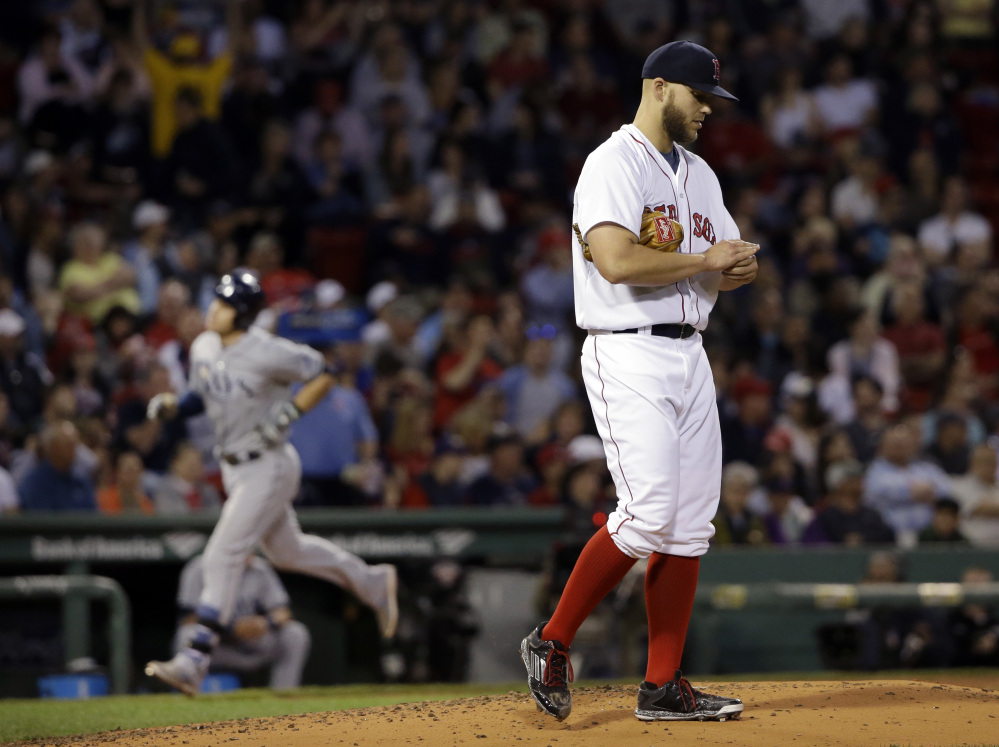 Red Sox starting pitcher Justin Masterson reacts as Tampa Bay’s Evan Longoria rounds third base with a solo homer in the fourth inning Wednesday night at Fenway Park. Masterson lasted less than five innings, walking six.