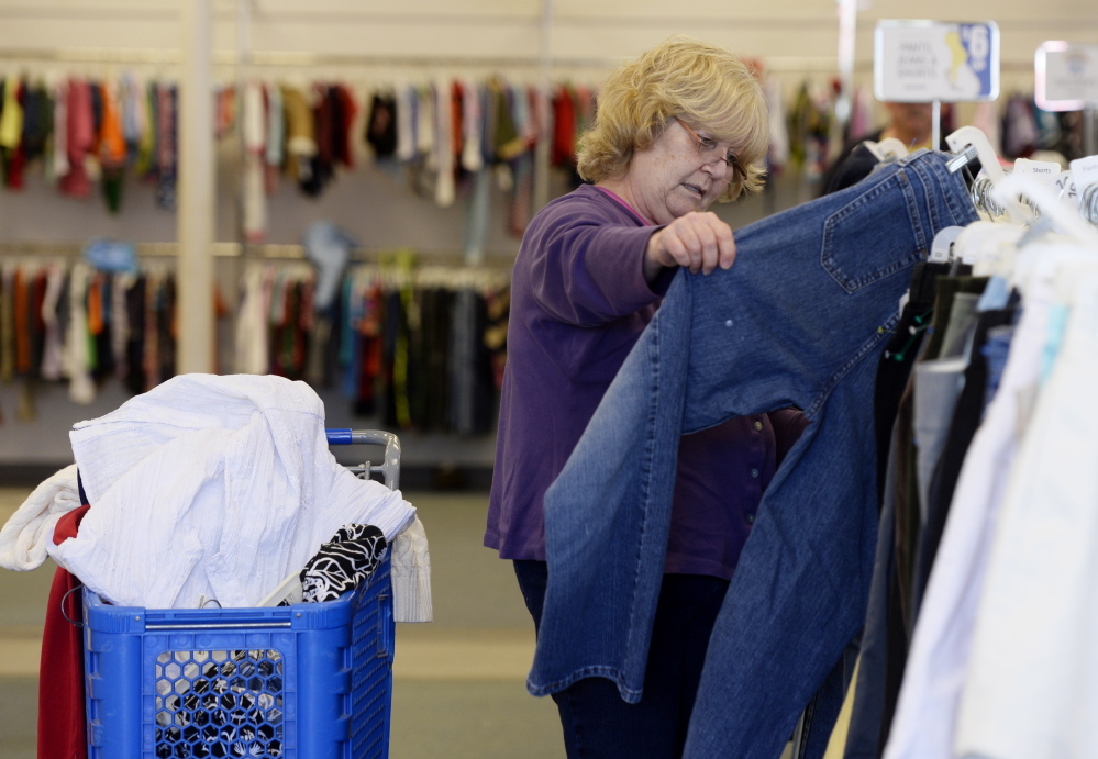 Sandra Smith of Portland shops at the Goodwill store in Portland on Friday.
Shawn Patrick Ouellette/Staff Photographer