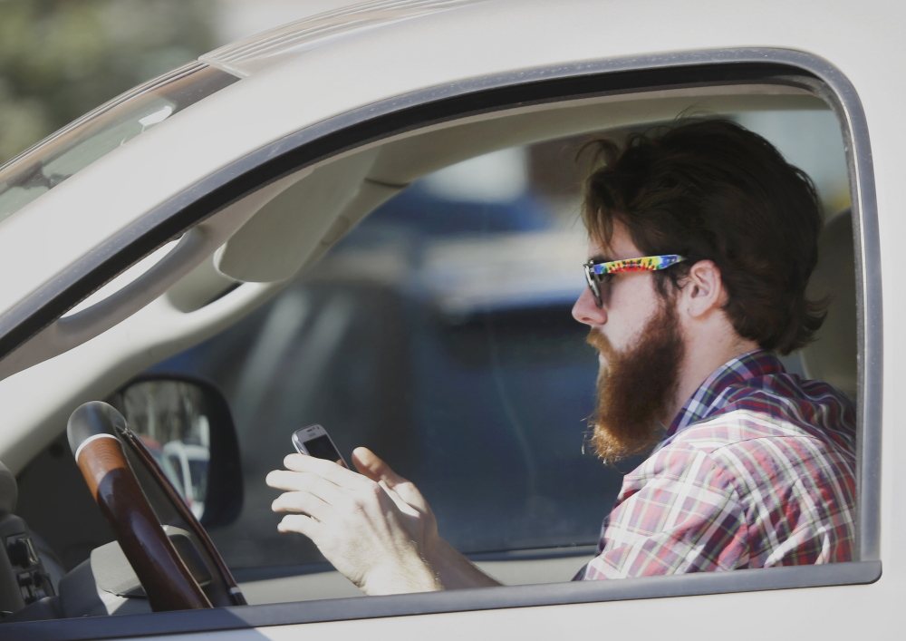 Alarmed by the danger of distracted motorists, a professor has invented a software program that can block a driver from sending or receiving text messages.