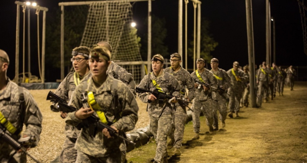 U.S. soldiers cool down after a 2-mile run with their weapons before participating in an obstacle course at Fort Benning, Ga., as part of the Ranger Training Assessment Course.
