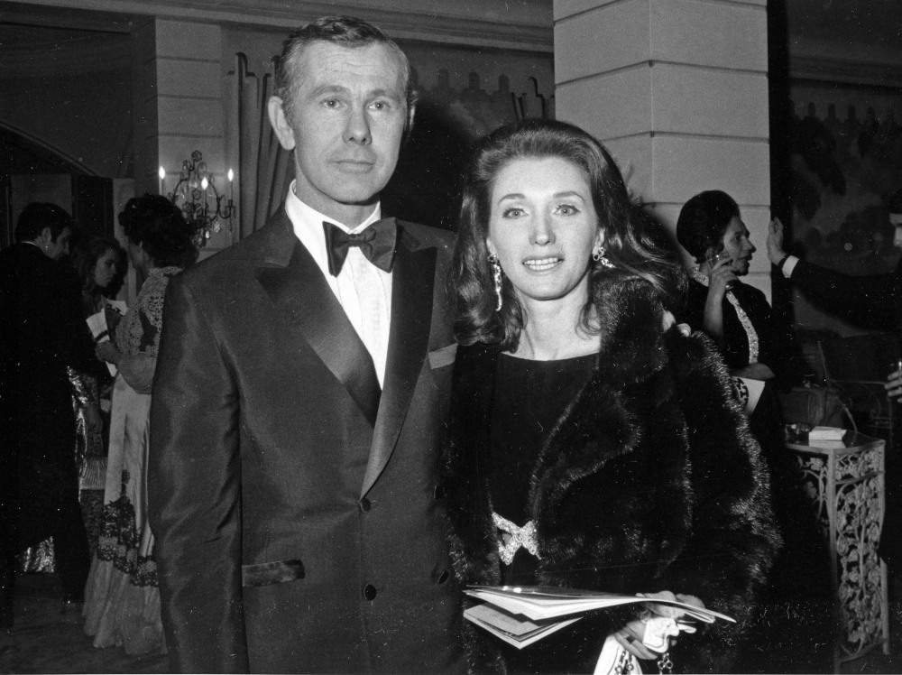 In this Dec. 16, 1969 file photo, comedian Johnny Carson and his wife Joanne Carson attend a party in the Grand Ballroom of New York’s Hotel Pierre following the opening of “Hello Dolly.”