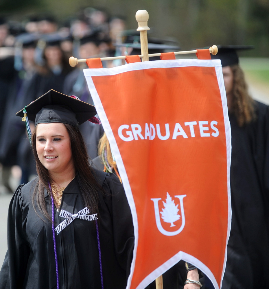 Jessica Schwartz leads her class into commencement ceremonies at Unity College in Unity on Saturday.