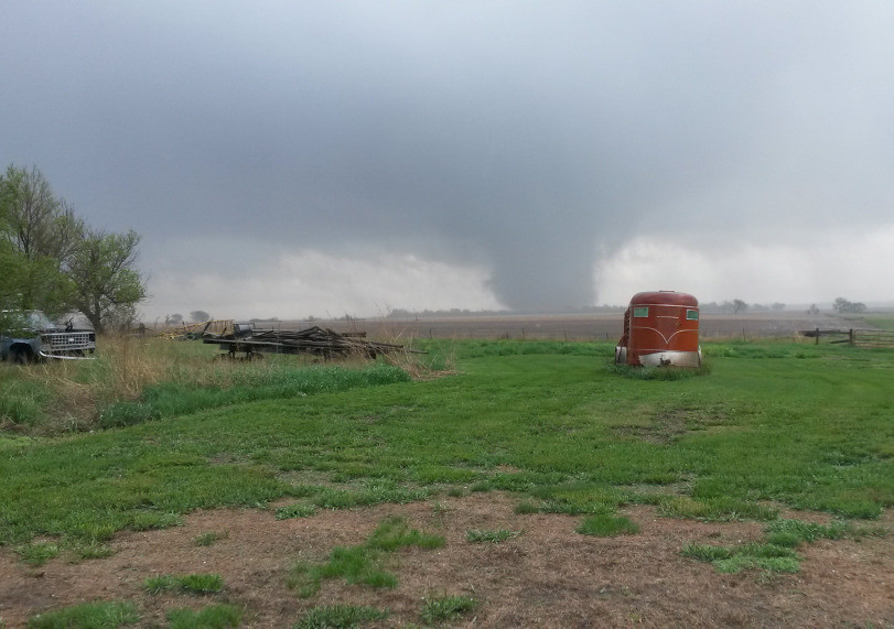 A tornado cuts through parts of Delmont, S.D., on Sunday. About 20 buildings were damaged and the town was evacuated after being left without water, power and phones.