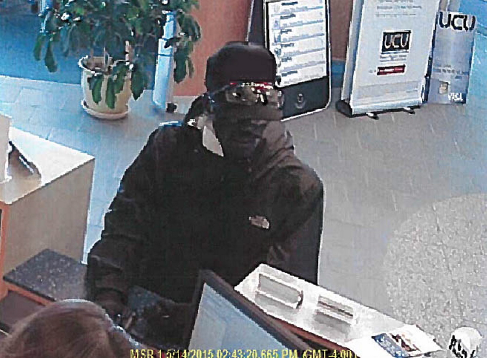 A security camera image shows the man who robbed the University Credit Union in Portland on Thursday. The image has been altered by the Press Herald to remove profanity from the robber’s hat.