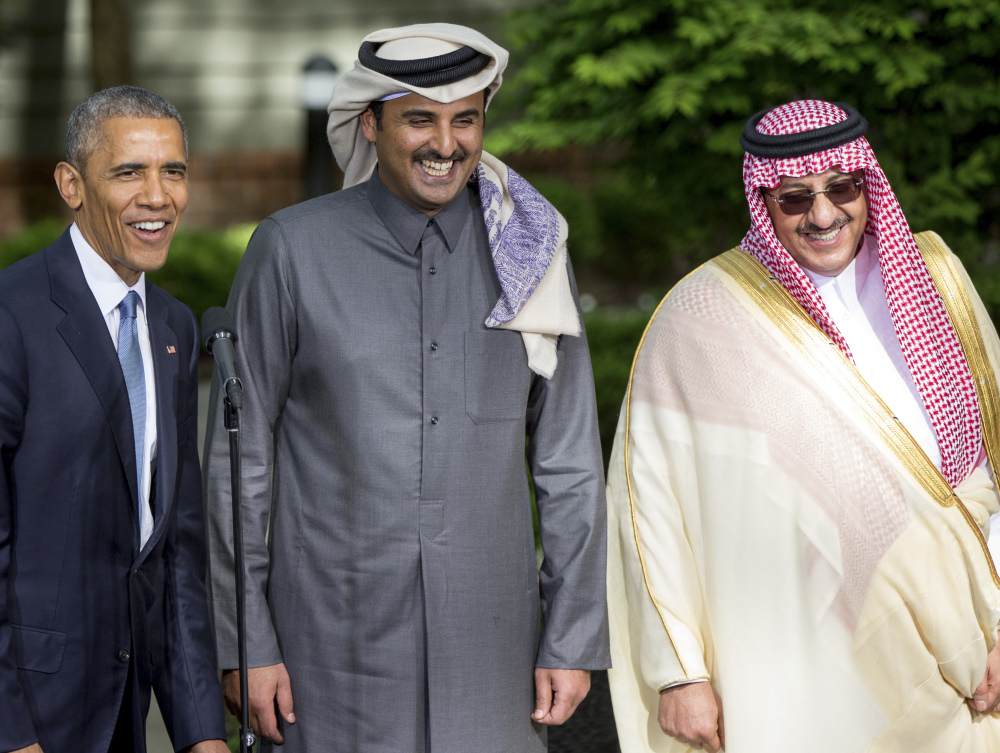 President Obama addresses the media with Qatar’s Emir Sheikh Tamim bin Hamad Al-Thani  center, and Saudi Arabia Crown Prince Mohammed bin Nayef.