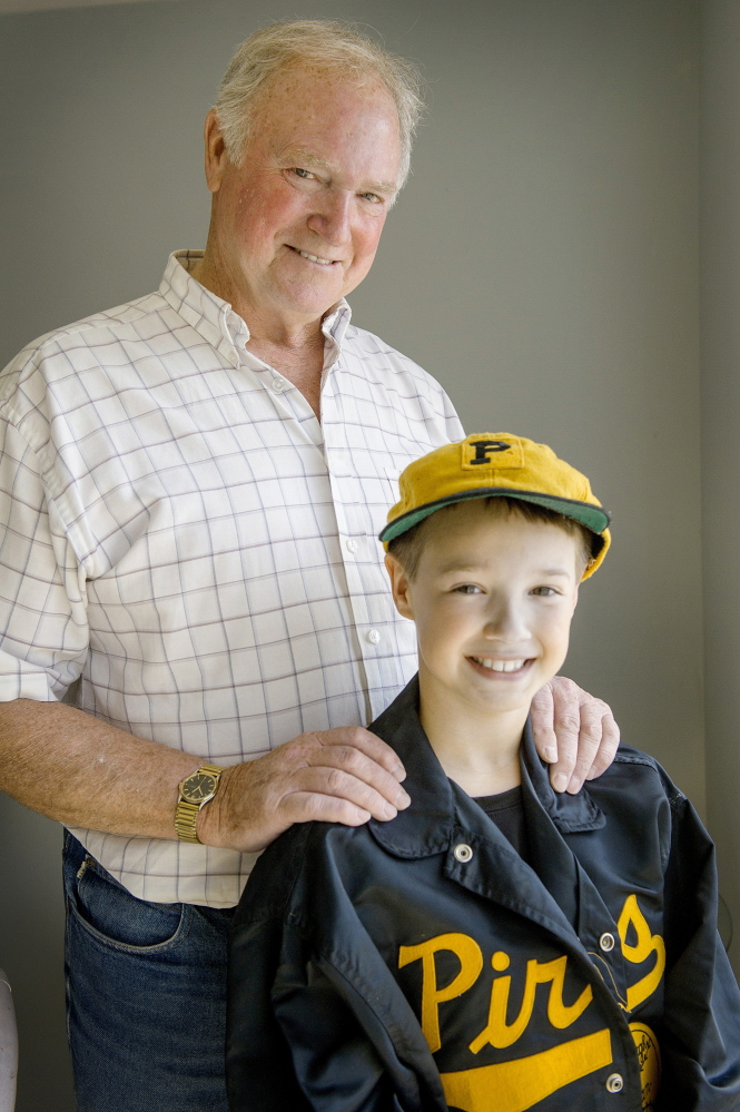 Ricky Swan was a star baseball player and athlete at Westbrook High in the mid-1960s before playing minor league ball, then joining the Portland Twilight League. Swan’s grandson Jake Earl, 9, of Windham wears uniform items from Swan’s first minor league team in Class A baseball for the Pittsburgh Pirates.