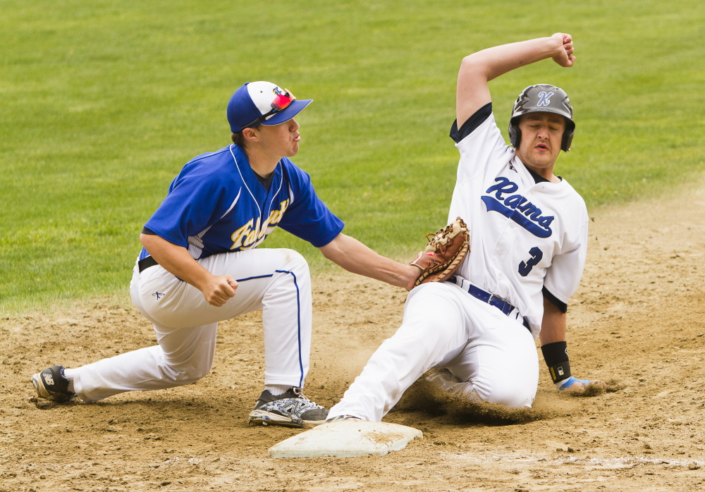 Falmouth first baseman Colby Emmertz doubles up Kennebunk baserunner Sam Heikinen as he attempts to get back to the base Saturday.