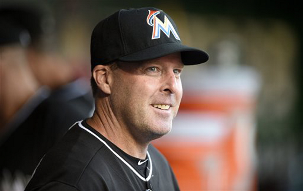 Miami Marlins Manager Mike Redmond, a former Portland Sea Dogs player, was fired on Sunday.