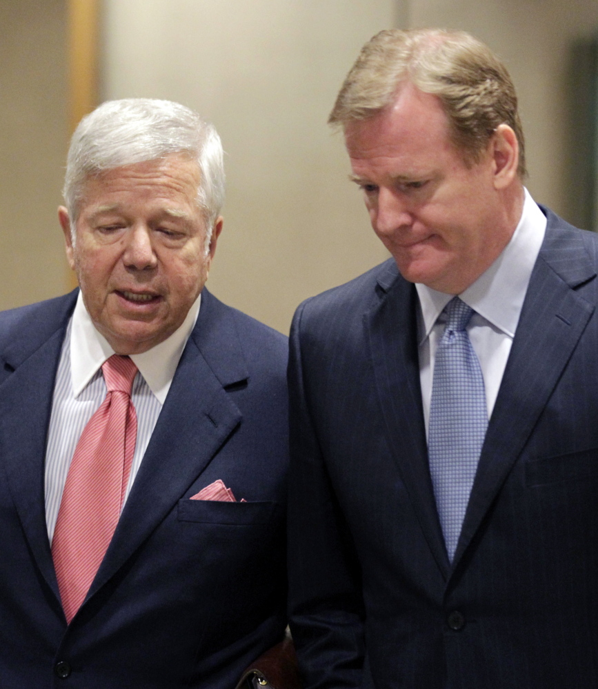In happier times, Pats owner Robert Kraft, left, talks with NFL Commissioner Roger Goodell while arriving at the owners meetings four years ago. When asked during the weekend about his current relationship with Goodell, Kraft said: “You’ll have to ask him.”