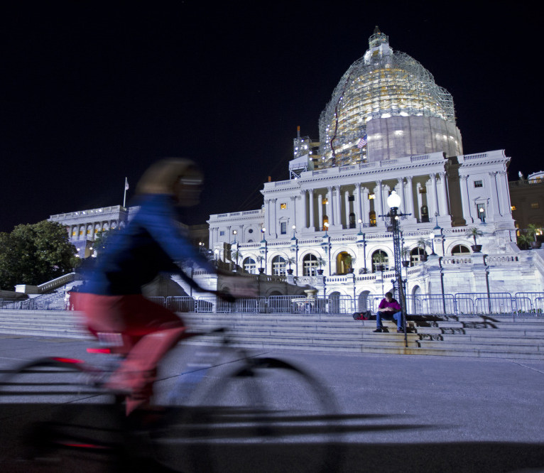 The U.S. Capitol is illuminated Friday night as the Senate works late on important bills that require action.