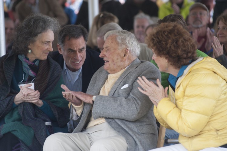 David Rockefeller, center, his daughter Neva Rockfeller Goodwin, left, and Eileen Rockfeller, right, talk at a ceremony Friday in Mount Desert marking the gift of 1,000 acres of woodlands, streams, hiking trails and carriage roads abutting Acadia National Park.