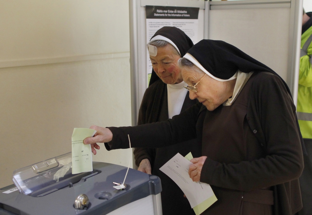 Carmelite sisters cast their vote at a polling station in Malahide, County Dublin, Ireland, on Friday.