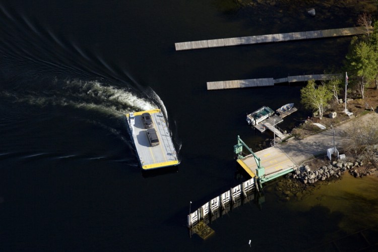 The ferry pulls up to the dock at Frye Island in Sebago Lake, in this aerial photo taken in 2015.