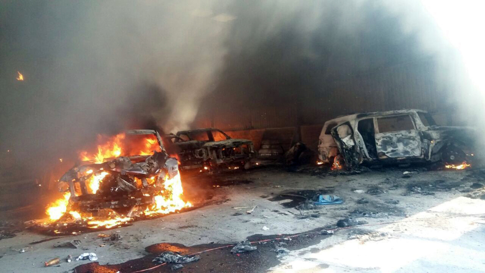 Vehicles burn after a gunbattle at Rancho del Sol, near Ecuanduero, in western Mexico, on Friday.