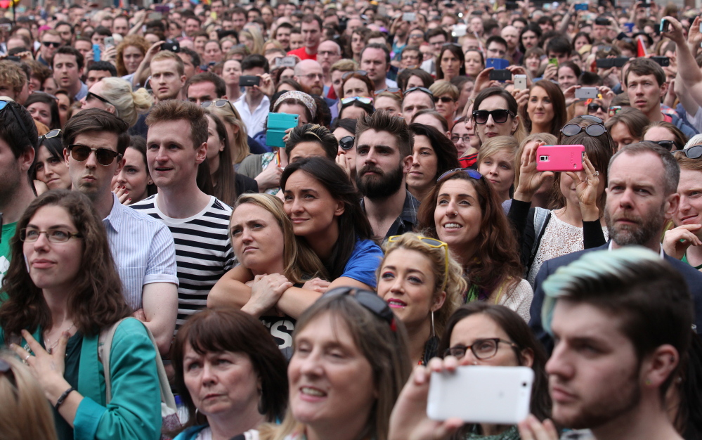 Supporters wait for the final result at Dublin castle in Ireland on Saturday.
The Associated Press