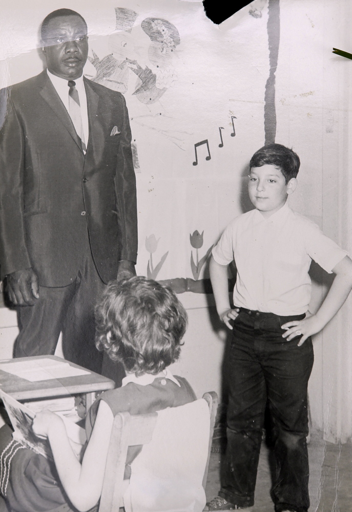 Mike Feldman, 8, stands at the head of the class with boxer Sonny Liston when the former heavyweight champion visited Feldman’s school in Poland while he was in Maine to fight Muhammad Ali in 1965.