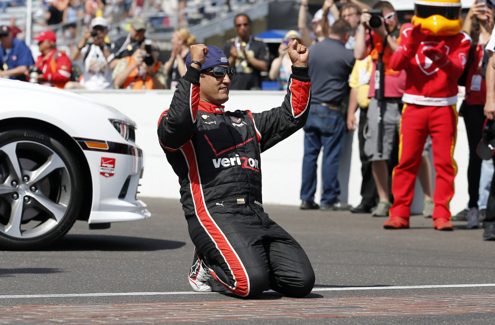 Juan Pablo Montoya of Colombia celebrates after winning the 99th running of the Indianapolis 500 on Sunday.
The Associated Press